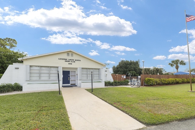 exterior space with a front lawn