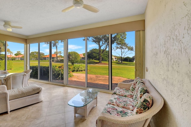 sunroom with ceiling fan