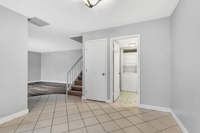 1707 17th Ln, Palm Beach Gardens, FL 33418 - spare room with baseboards and stairway