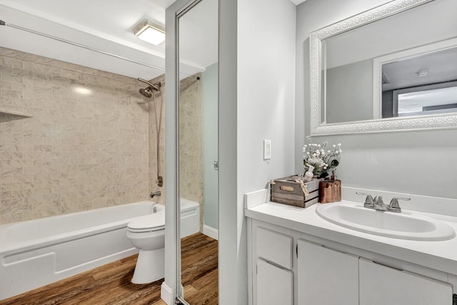 1707 17th Ln, Palm Beach Gardens, FL 33418 - bathroom with wood finished floors,  shower combination, vanity, and toilet