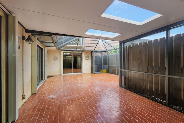 1707 17th Ln, Palm Beach Gardens, FL 33418 - unfurnished sunroom with a skylight