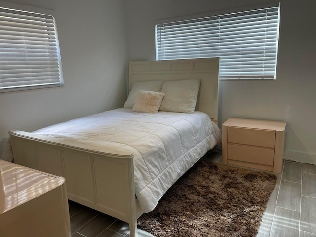 bedroom with light hardwood / wood-style floors