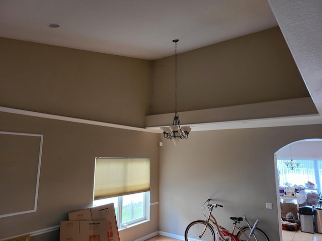 dining room with a healthy amount of sunlight and a notable chandelier