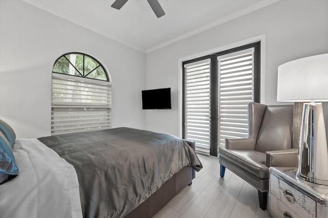 bedroom with ceiling fan and crown molding