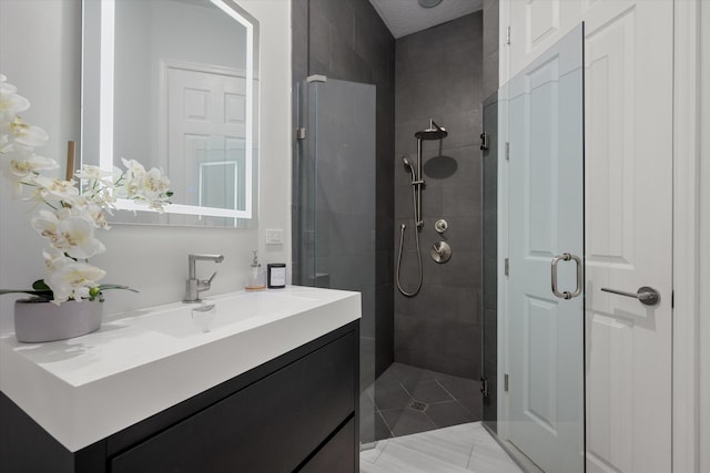 bathroom with vanity and walk in shower