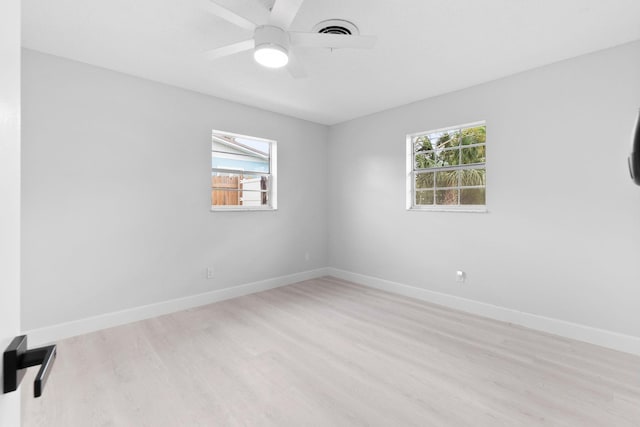 unfurnished room featuring ceiling fan and light hardwood / wood-style floors