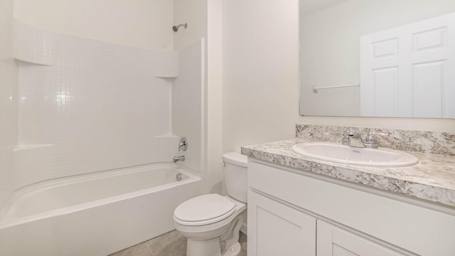 full bathroom featuring vanity, tile patterned floors,  shower combination, and toilet