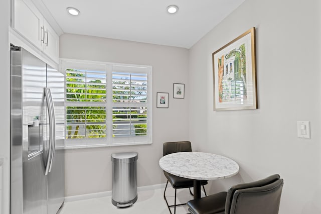 view of tiled dining space