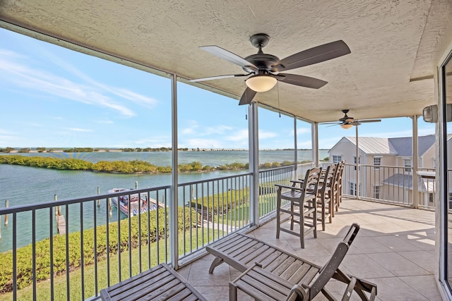 sunroom with a water view