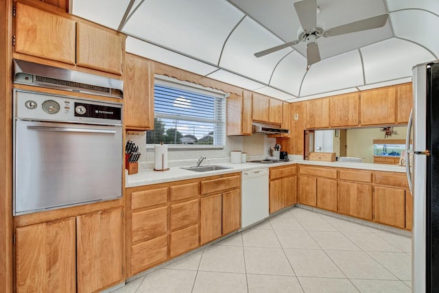 kitchen with ceiling fan, sink, light tile patterned floors, and appliances with stainless steel finishes