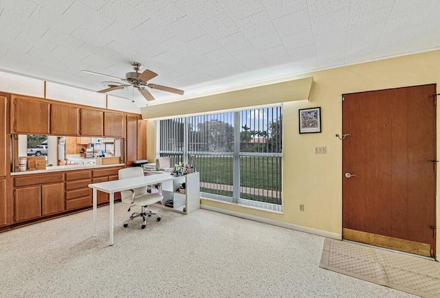 home office with ceiling fan