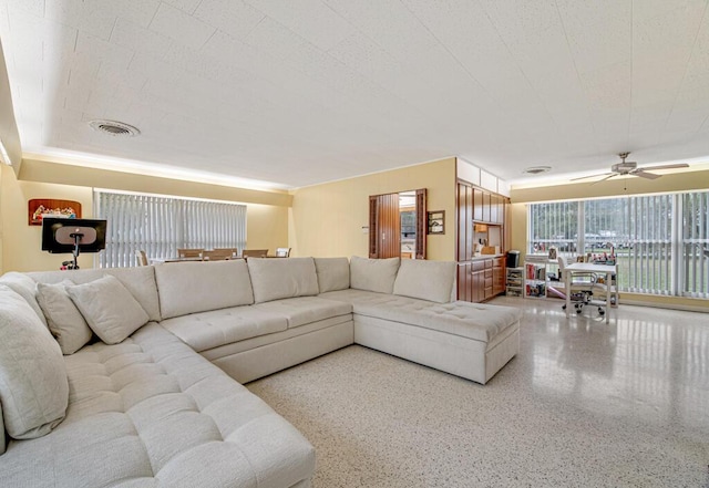 living room featuring ceiling fan