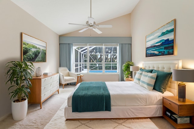 bedroom with ceiling fan, vaulted ceiling, and light carpet