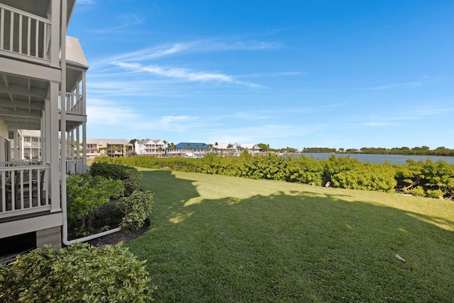 view of yard with a water view