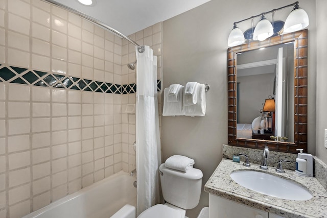 full bathroom featuring toilet, shower / tub combo, and vanity