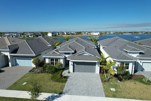 drone / aerial view with a water view