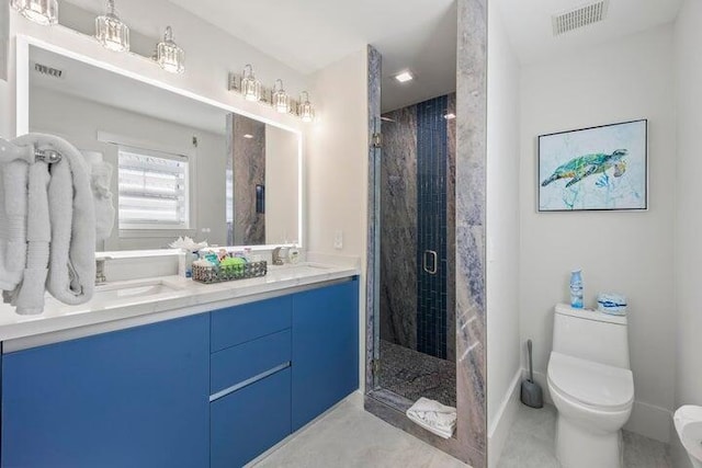 bathroom featuring toilet, vanity, and an enclosed shower