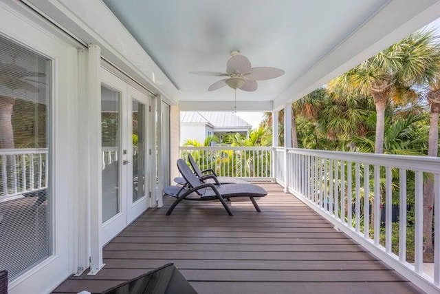 deck with ceiling fan and french doors