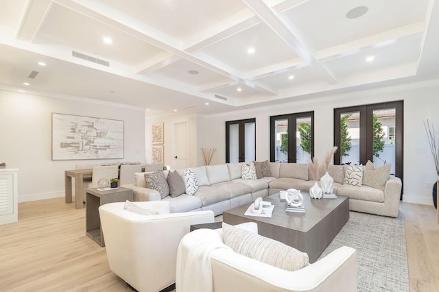 living room featuring french doors, light wood-type flooring, coffered ceiling, and beam ceiling