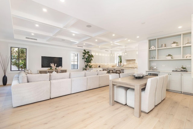 315 Avila Rd, West Palm Beach, FL 33405 - kitchen featuring light wood-type flooring, coffered ceiling, recessed lighting, light countertops, and decorative backsplash
