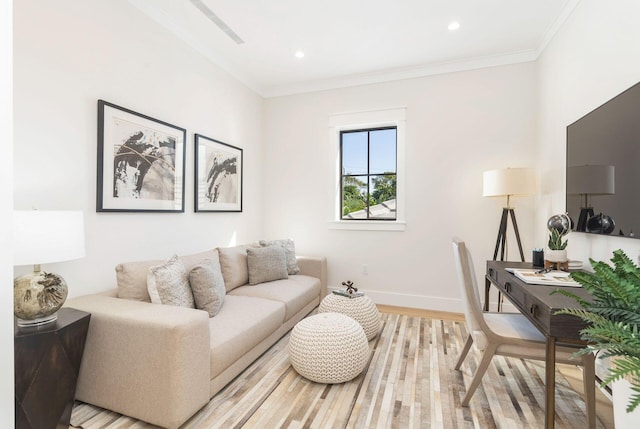 living room with crown molding and light hardwood / wood-style floors