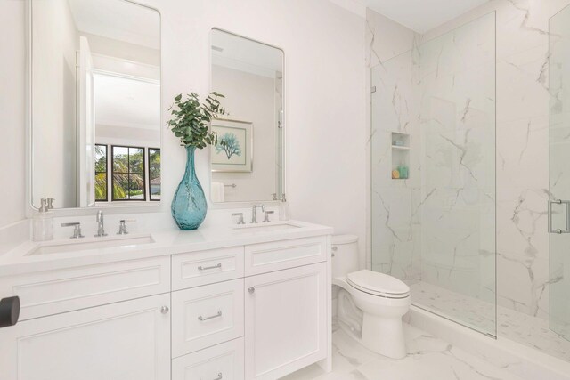 315 Avila Rd, West Palm Beach, FL 33405 - bathroom with marble look tiles, a marble finish shower, and double vanity