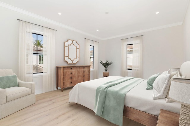 315 Avila Rd, West Palm Beach, FL 33405 - bedroom featuring light wood-style floors, ornamental molding, multiple windows, and recessed lighting
