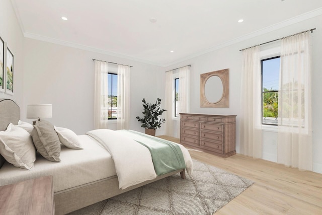 315 Avila Rd, West Palm Beach, FL 33405 - bedroom featuring light wood finished floors, crown molding, and recessed lighting