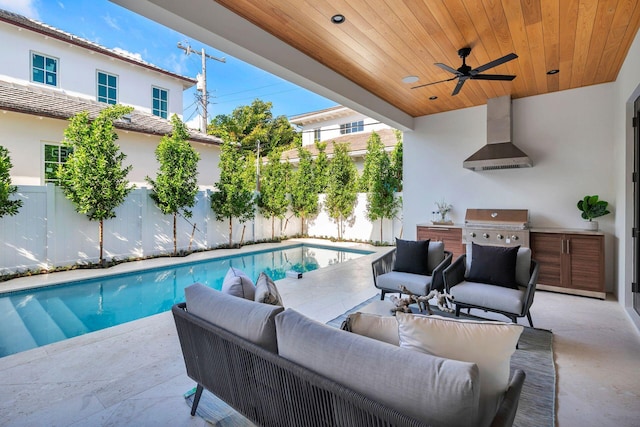 view of pool with an outdoor hangout area, area for grilling, ceiling fan, and a patio area