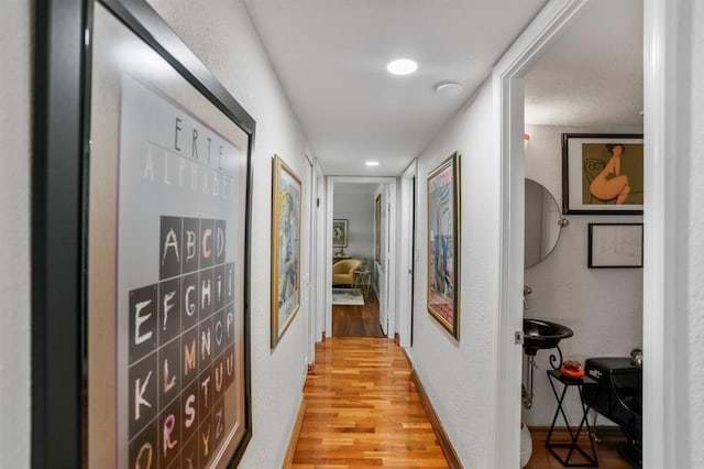 hallway featuring light wood-type flooring