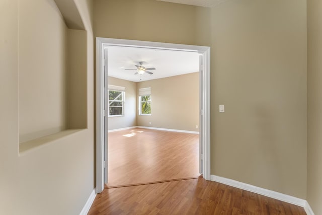 hallway featuring hardwood / wood-style floors