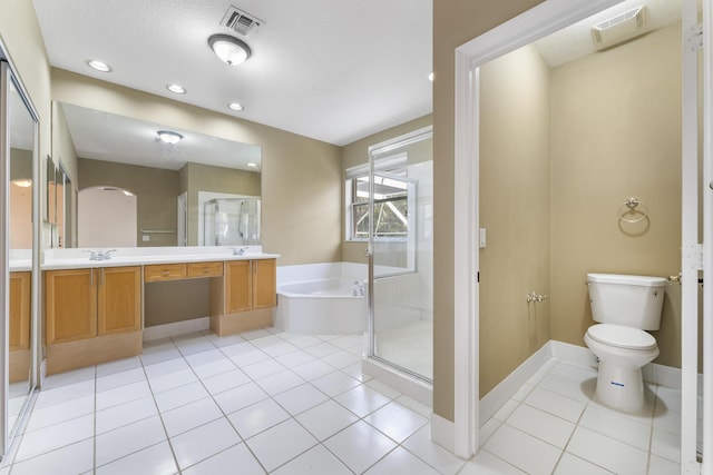 full bathroom featuring a textured ceiling, vanity, independent shower and bath, tile patterned flooring, and toilet