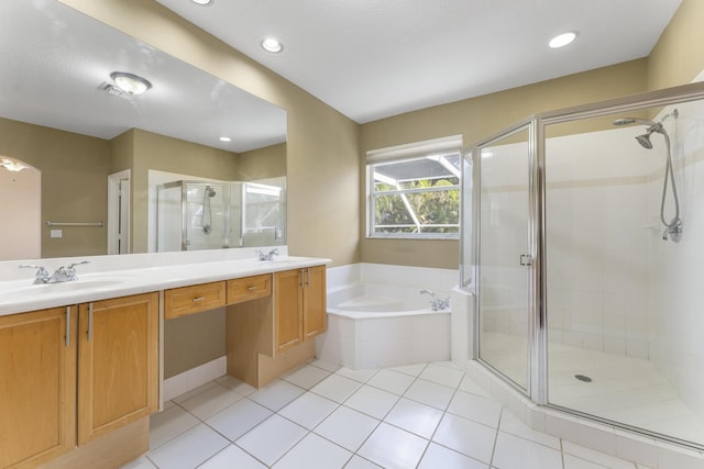 bathroom with separate shower and tub, tile patterned floors, and vanity