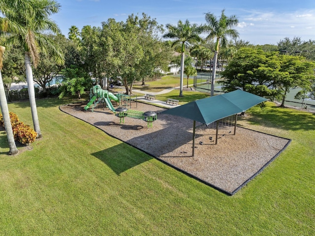 surrounding community featuring a yard and a playground