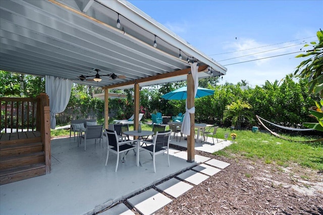 view of patio / terrace featuring ceiling fan