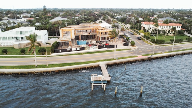 exterior space featuring a water view and a residential view
