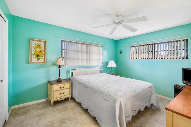 10070 Eaglewood Rd Unit B, Boynton Beach, FL 33436 - bedroom with a ceiling fan and light tile patterned floors