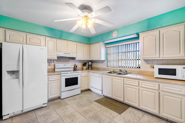 kitchen featuring ceiling fan, sink, backsplash, white appliances, and light tile patterned floors