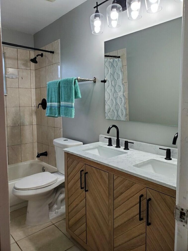 full bathroom featuring tile patterned floors, vanity, and toilet