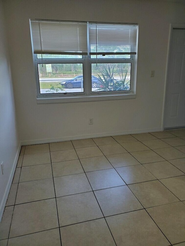 view of tiled spare room