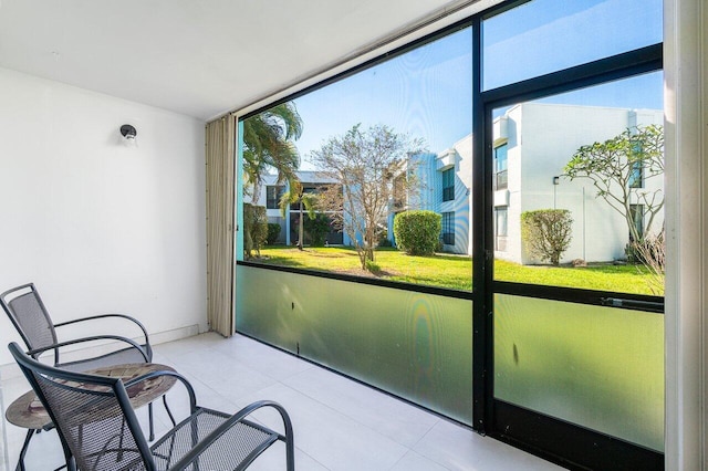 sunroom featuring a wealth of natural light