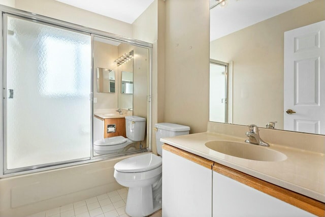 full bathroom with tile patterned flooring, vanity, bath / shower combo with glass door, and toilet