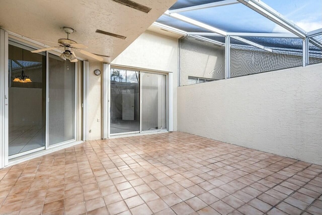 view of patio featuring ceiling fan