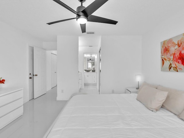 bedroom with ceiling fan and ensuite bathroom