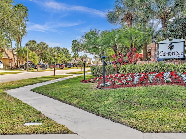 view of community featuring a lawn