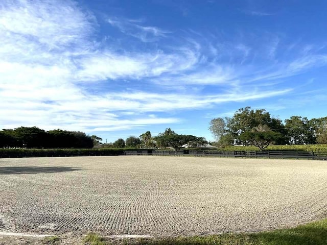 view of yard with a rural view