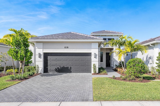 view of front of property featuring a garage