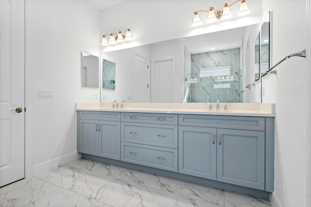 bathroom with vanity and tiled shower