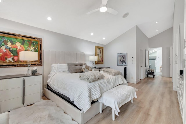 bedroom featuring ceiling fan, light wood-type flooring, and high vaulted ceiling