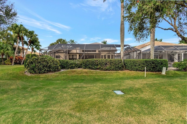 view of yard featuring a lanai